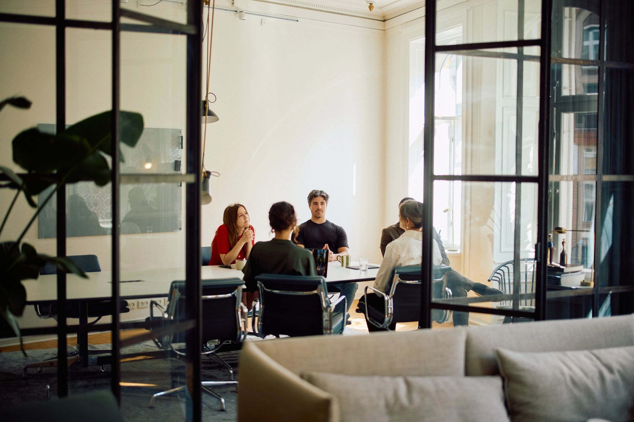 Business professionals collaborating in a bright modern office